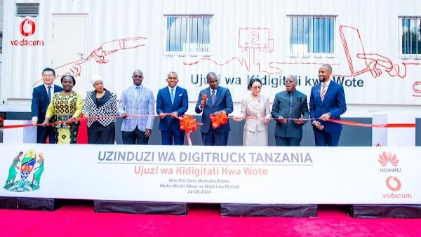 Deputy Prime Minister and Energy minister Dr Doto Biteko (4th-R) cuts the ribbon in Dar es Salaam at the weekend to launch DigiTruck Tanzania, a partnership between Vodacom and Huawei Tanzania dedicated to bringing digital education to underserved people.