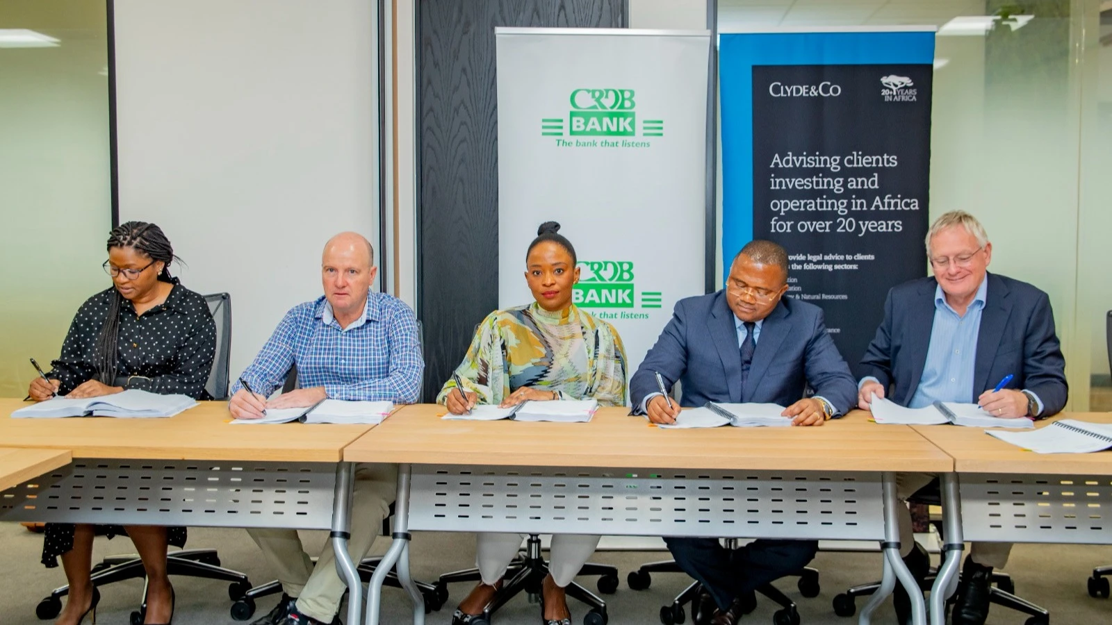 CRDB Bank Group CEO and managing director Abdulmajid Nsekela (2nd-R) pictured with senior officials representing firms involved in the Mahenge Graphite Project at the signing of the project’s financing agreement in South Africa at the weekend. 