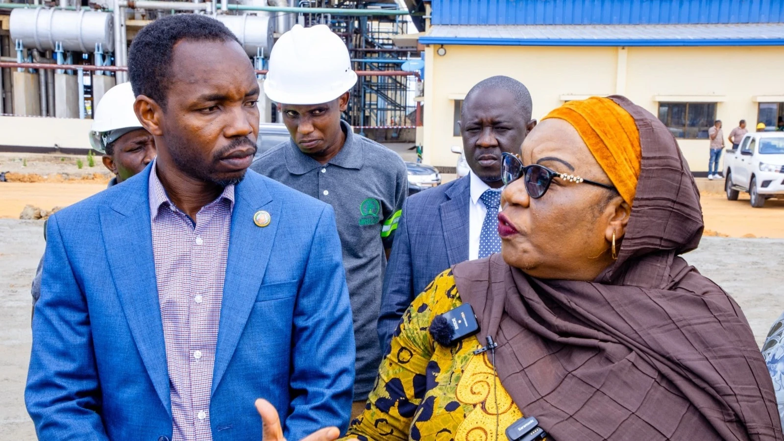 Fatma Taufiq, (R), the chairperson of the Social Welfare and Development standing committee of the National Assembly, speaks with Patrobas Katambi, the Labour, Youth, Employment and the Disabled state deputy minister in the Prime Minister’s Office, 