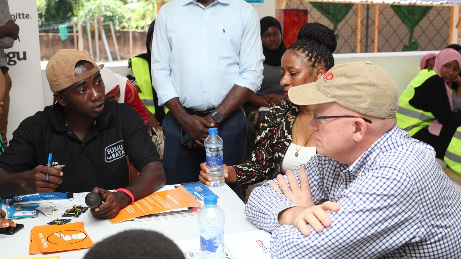 USAID Mission Director for Tanzania Craig Hart keen listens to community youth peer champion leader Shomari when he visited care and treatment center at Sokoine Regional Referral Hospital in Lindi Region. The facility is supported by the USAID Afya Yangu 