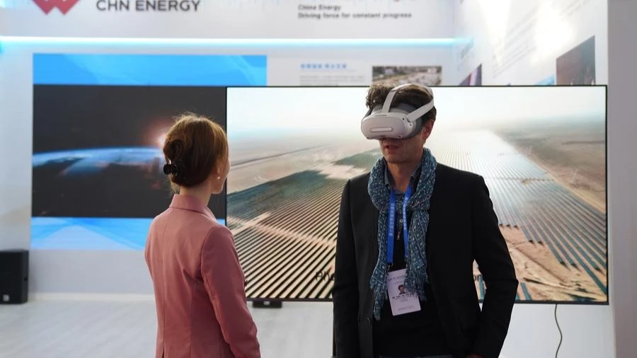 A participant tries VR at the venue of the opening ceremony of the 6th World Media Summit in Urumqi, capital city of northwest China's Xinjiang Uygur Autonomous Region, Oct. 14, 2024. 