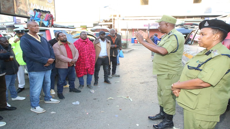 Assistant Police Commissioner (ACP) Michael Deleli, the head of public education and training at the Traffic Police speaks to passenger bus drivers in Arusha city, asking them to use w polite language when serving passengers. 