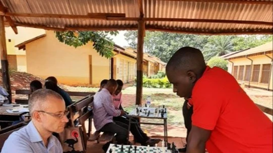 Konrad Czernichowski (seated left), chess coach and lecturer at Jordan University in Morogoro, alongside Shedrack Lusako Mwakajila (standing right), Tanzania’s representative at the recent Chess Olympiad in Hungary.