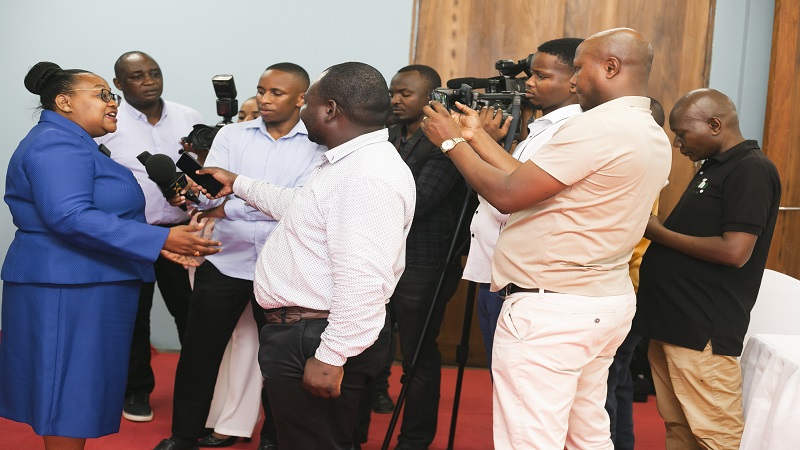 Natural Resources and Tourism minister Dr Pindi Chana (L) briefs journalists in Dar es Salaam on Monday on the sidelines of a meeting between her Ministry and a visiting delegation of Chinese officials,