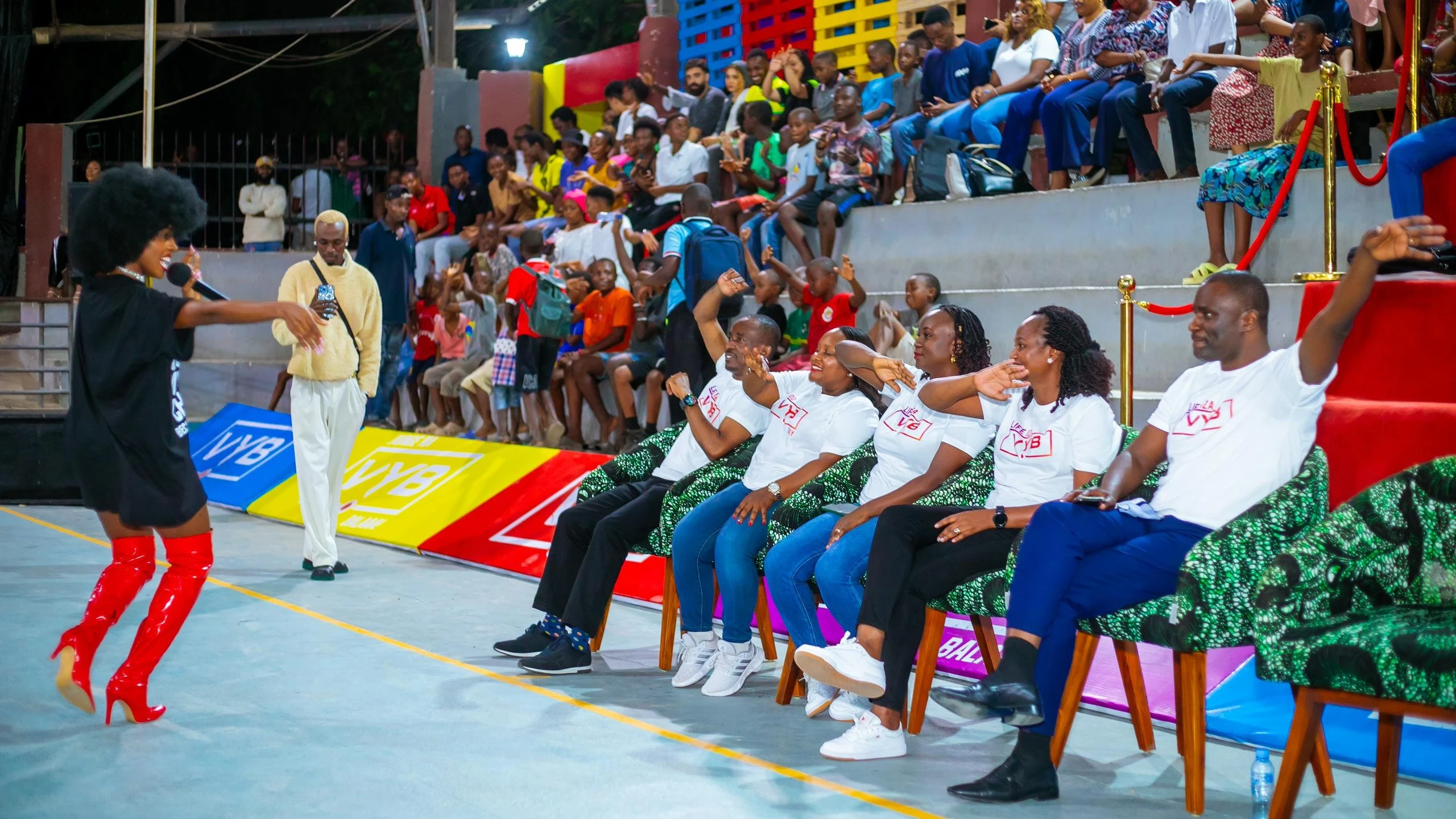 An artist Saraphina Michael performs in front of Vodacom Tanzania Plc management team during launch of the VYB Balaa! Mtu ni Connection! campaign. 