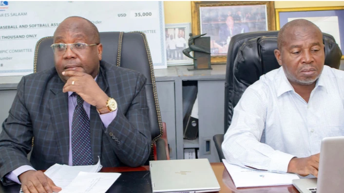 Tanzania Olympic Committee (TOC) election committee chairman Ibrahim Mkwawa (left) speaks to announce TOC’s general meeting’s date and procedures. With him is the committee’s secretary general, Khalfan Salim Omar.