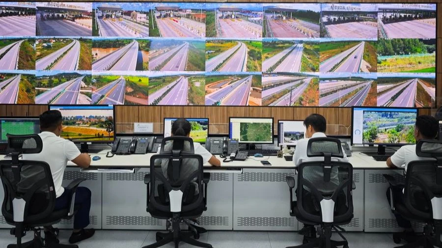 Staff members work in a traffic camera control room of the Phnom Penh-Sihanoukville Expressway in Phnom Penh, Cambodia, on Nov. 1, 2024.