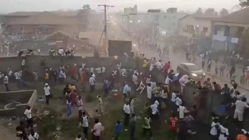 Guinea stadium crush kills 56 people after disputed refereeing decision.