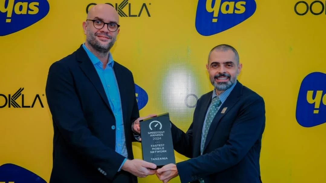 Yas Acting CEO, Jerome Albou (left) receiving the Ookla award today in Dar es Salaam as the company with the fastest internet in Tanzania from the representative of the Ookla Institute, Osama Nawayseh.