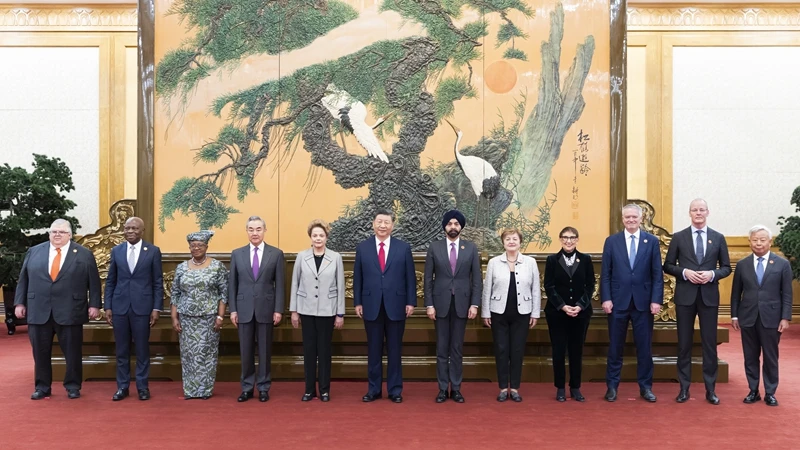 Chinese President Xi Jinping meets with heads of major international economic organizations, who came here for the "1+10" Dialogue, at the Great Hall of the People in Beijing, capital of China, Dec. 10, 2024.