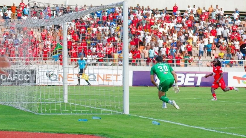 Simba Sports Club winger Kibe Denis (not in picture) scores his side’s second goal during their CAF Confederation Cup Group A match against CS Sfaxien at the Benjamin Mkapa Stadium on Sunday. Simba won 2-1. 