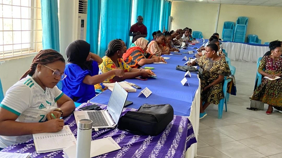 Caption: Participants listen attentively to the facilitator on the importance of GRB. 