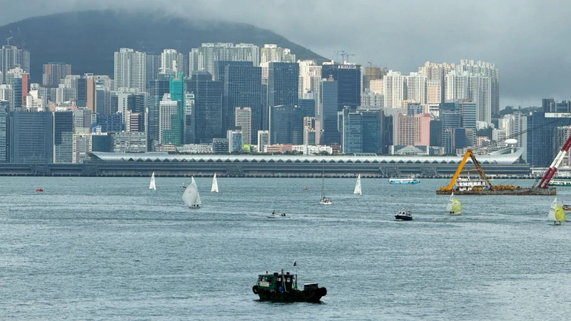 Boats ply Victoria Harbour of Hong Kong under a cloudy sky on Sept 9, 2024. 