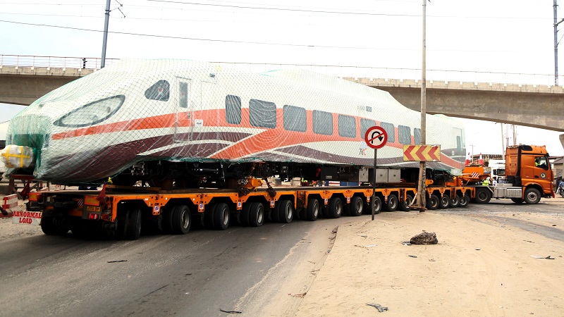 Standard Gauge Rail locomotive being transported on a special truck from the Port of Dar es Salaam to the Magufuli Station in Dar es Salaam City yesterday. 