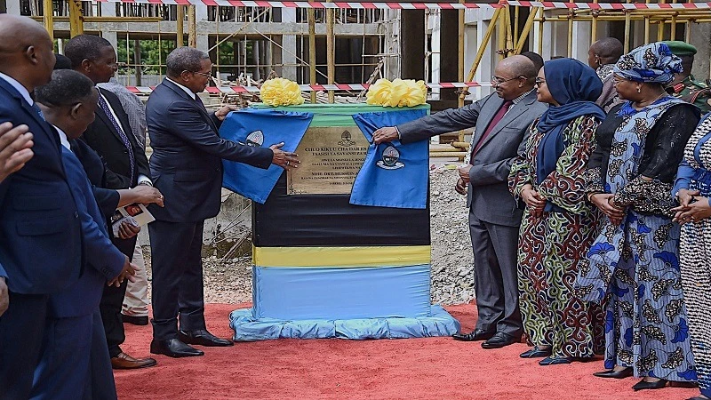 Zanzibar President Dr Hussein Ali Mwinyi and University of Dar es Salaam chancellor, former president Jakaya Kikwete, unveil a plaque, a foundation stone for the construction of an academic and administration building for the Institute of Marine Sciences.