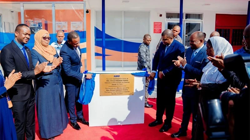 Zanzibar’s Second Vice President, Hemed Suleiman Abdulla (3rd R), inaugurates NMB Wete Branch by laying the foundation stone during its launch over the past weekend