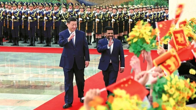 President Xi Jinping hosts a welcoming ceremony for visiting Sri Lankan President Anura Kumara Dissanayake before their talks at the Great Hall of the People in Beijing on Wednesday. 