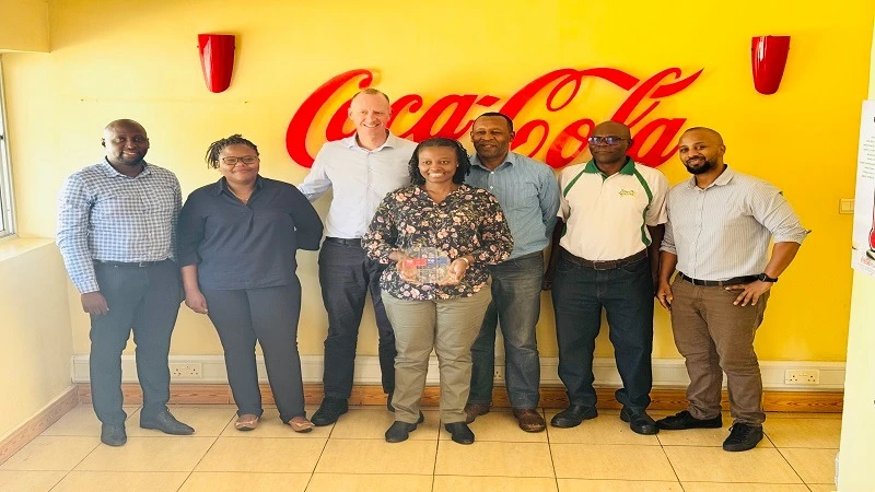 Leaders of CCBA in Tanzania with the top employer award. From left is Emmanuel Kyarwenda, Fatma Mnaro, Jonathan Jooste, Scolastika Augustine, Haji Ali, Hassan Waziri and Salum Nassor