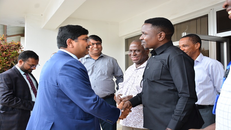 The Deputy General Manager of The Guardian Ltd (TGL), publishers of The Guardian and Nipashe newspapers, Jackson Paul (R), welcomes the Indian High Commissioner to Tanzania, Bishwadip Dey, during his visit to TGL offices at Mikocheni Light Industrial Area