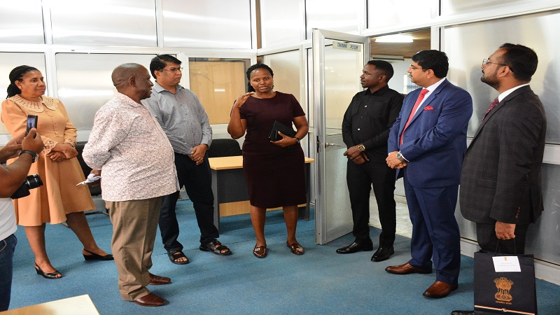 TGL's Digital Unit Manager and Nipashe newspaper News Editor Salome Kitomari (C), explains on the operations of the digital unit to the High Commissioner Bishwadip Dey