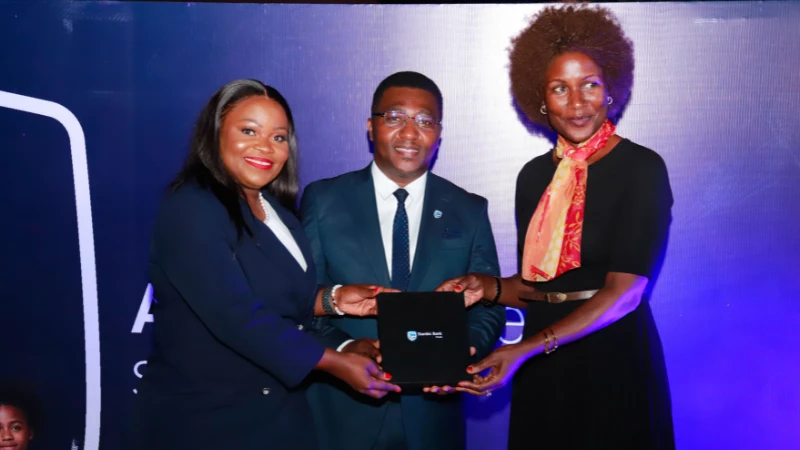 Stanbic Bank Tanzania Head of Private Banking, Shangwe Kisanji (left), Stanbic Bank Mwanza Branch Manager, Personal & Business Banking, Geofrey Makondo (centre), and Stanbic Bank customer, GardaWorld Mwanza Branch Manager, Levina Beal, officially launch.