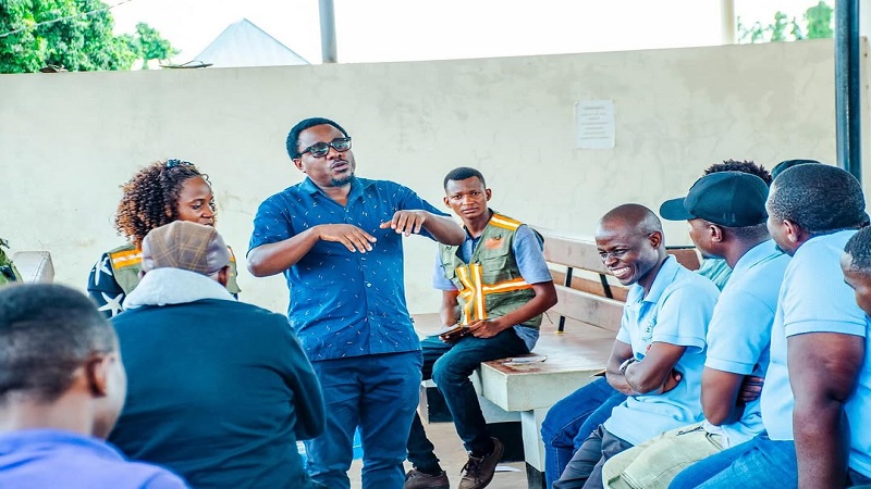 Amani Mwakalebela (gesturing), a LATRA supervisor in Ifakara, sensitizes long-distance bus drivers and agents on road safety compliance in Kilombero at the weekend.