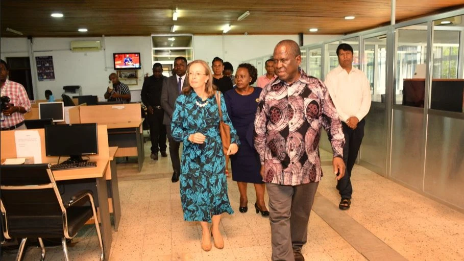 The Executive Editor of The Guardian newspaper, Wallace Mauggo (right), and the British Ambassador to Tanzania, Marianne Young, being taken on a tour of The Guardian TGL newspaper's newsroom.