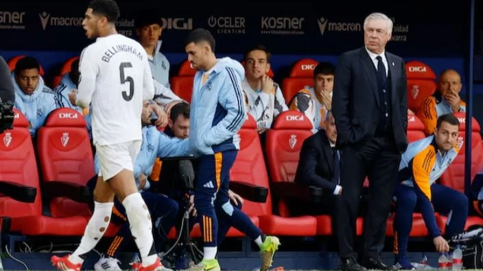 Real Madrid coach Carlo Ancelotti looks on as Real Madrid's Jude Bellingham is sent off during their LaLiga match against Osasuna at El Sadar Stadium, in Pamplona, Spain on Saturday.