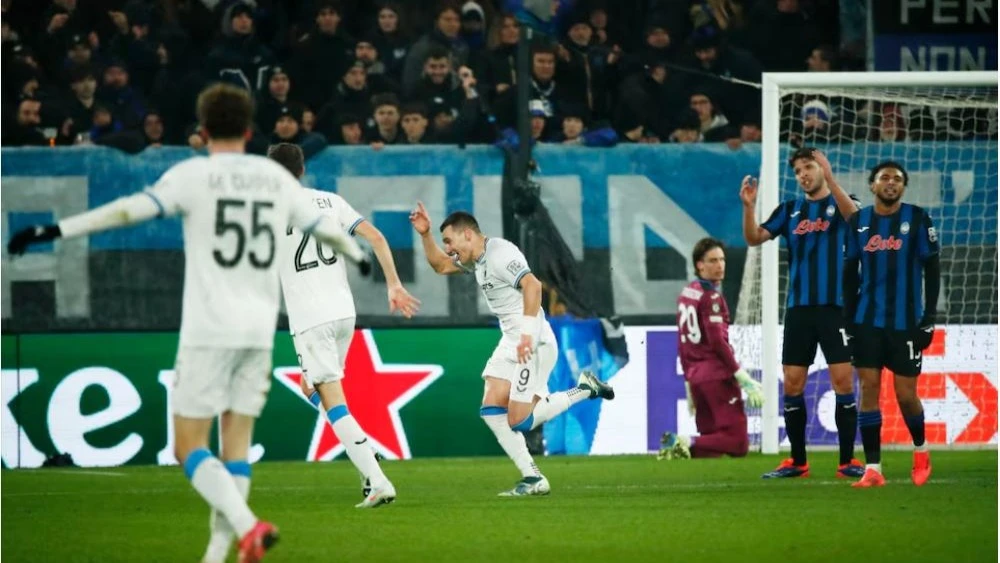 Club Brugge's Ferran Jutgla celebrates scoring their third goal during their Champions League - Knockout Phase Playoff - Second Leg match against Atalanta at Gewiss Stadium, in Bergamo, Italy on Tuesday.