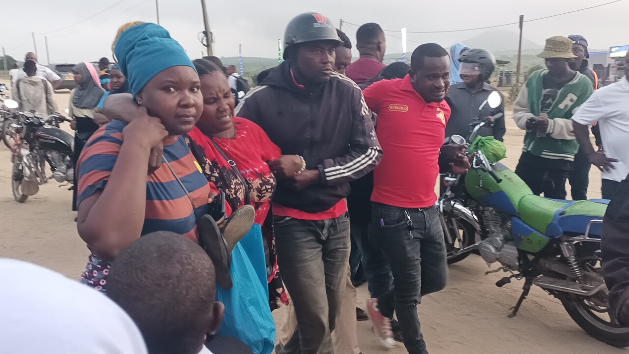 One of the 15 injured passengers from a Min bus, being assisted into a vehicle to be taken to the hospital after their bus was rear-ended by a Fuso truck at Kihonda, along the Morogoro-Dodoma highway yesterday.