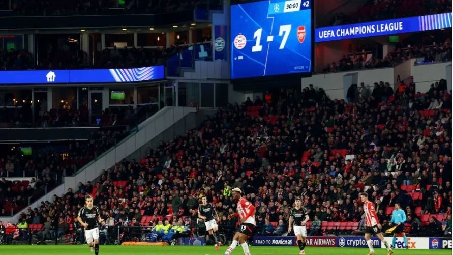 General view as the big screen displays the score during the Champions League - Round of 16 - First Leg match involving PSV Eindhoven and Arsenal at Philips Stadion, in Eindhoven, Netherlands on Tuesday. Agencies