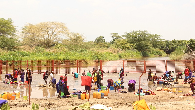 Kweisewa Village residents near Ruvu River, Korogwe, dry their clothes worry-free after the government erected a fence protecting them from crocodile attacks.