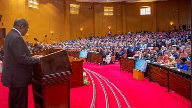 Vice President Dr. Philip Mpango, delivers his speech during the opening of leaders of the public institutions and organizations on Climate Change and Carbon Trading in Dar es Salaam yesterday. 