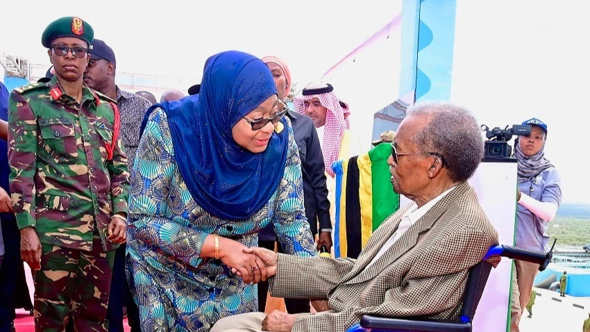 President Samia Suluhu Hassan has a word with former Prime Minister Cleopa David Msuya (93) shortly after launching a Same-Mwanga-Korogwe water project yesterday. 
