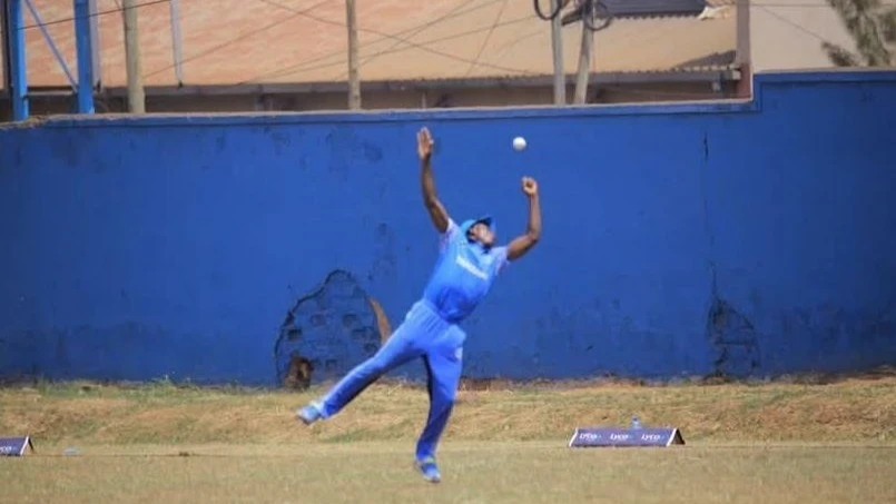 A Tanzania U-19 men's cricket team's performer aims for a catch as the squad took on Uganda Emerging XI in the 2025 Easter Youth ODI Series match in Kampala last week. 