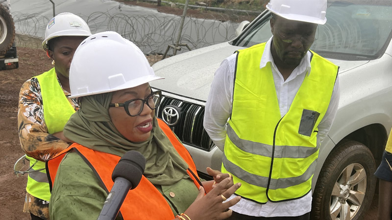 Kahama District Commissioner, Mboni Mhita, speaks to journalists after inspecting the construction site of a rainwater harvesting facility, which will serve as an alternative water source at the Barrick Buzwagi Mine yesterday. 