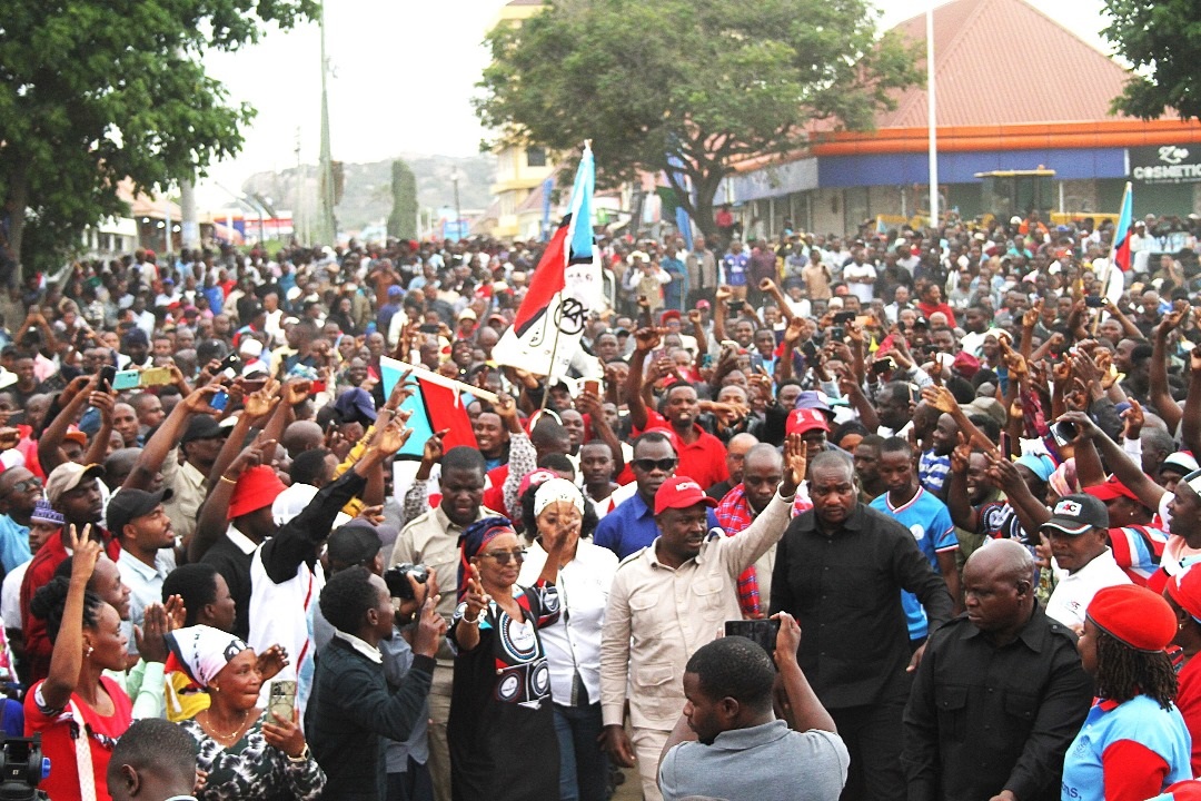 Chadema Vice Chairman (Mainland) John Heche (C, foreground, in red cap) arrives in Dodoma city yesterday ahead of the opposition party’s continuation of rallies. 