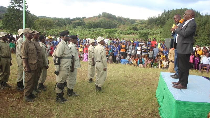 Mbeya Regional Commissioner Dr. Juma Homera, speaks to militiamen of Ikuti Ward in the Rungwe District Council during his recent tour to inspect various development projects.