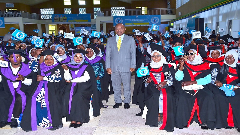 Zanzibar President Dr Hussein Ali Mwinyi in a souvenir photo yesterday at the graduation of the first batch of trainees who had just completed studies at a community health college. 