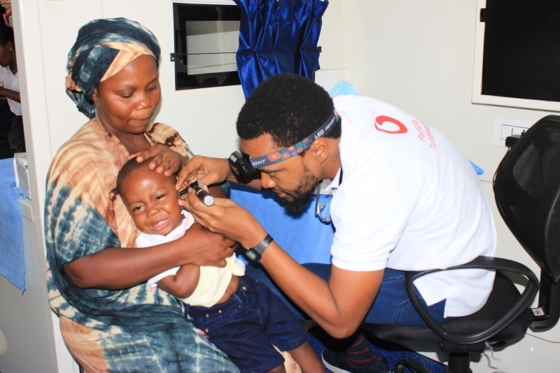 An ear, nose and throat (ENT) specialist with Muhimbili National Hospital examines a child during a three-day free medical camp the hospital held at the Korogwe Teachers’ College in Tanga Region on Friday. 